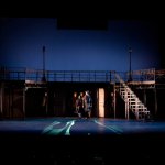 One of those fun moments in tech, a brief moment of an Ellis Island window projection spills over into the stage space as the Immigrants reach the island- kept for the production