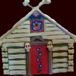 A Baba-Yaga house from cardboard and ethafoam. The actor wore this and her face showed when the she opened the red doors.